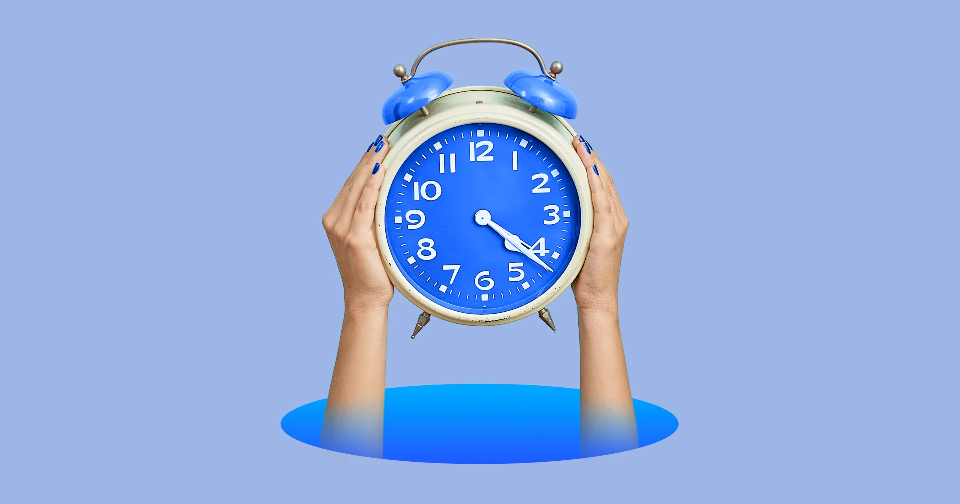 Hands holding a clock on a blue background